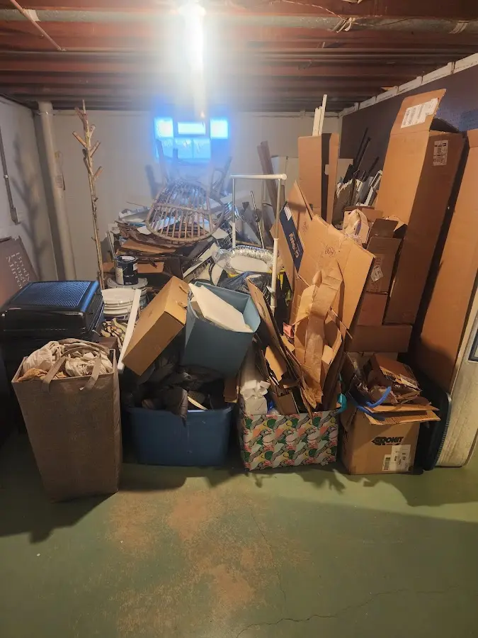 Roll-off dumpster container at job site for 20 Yard Dumpster Rental in Pinecrest